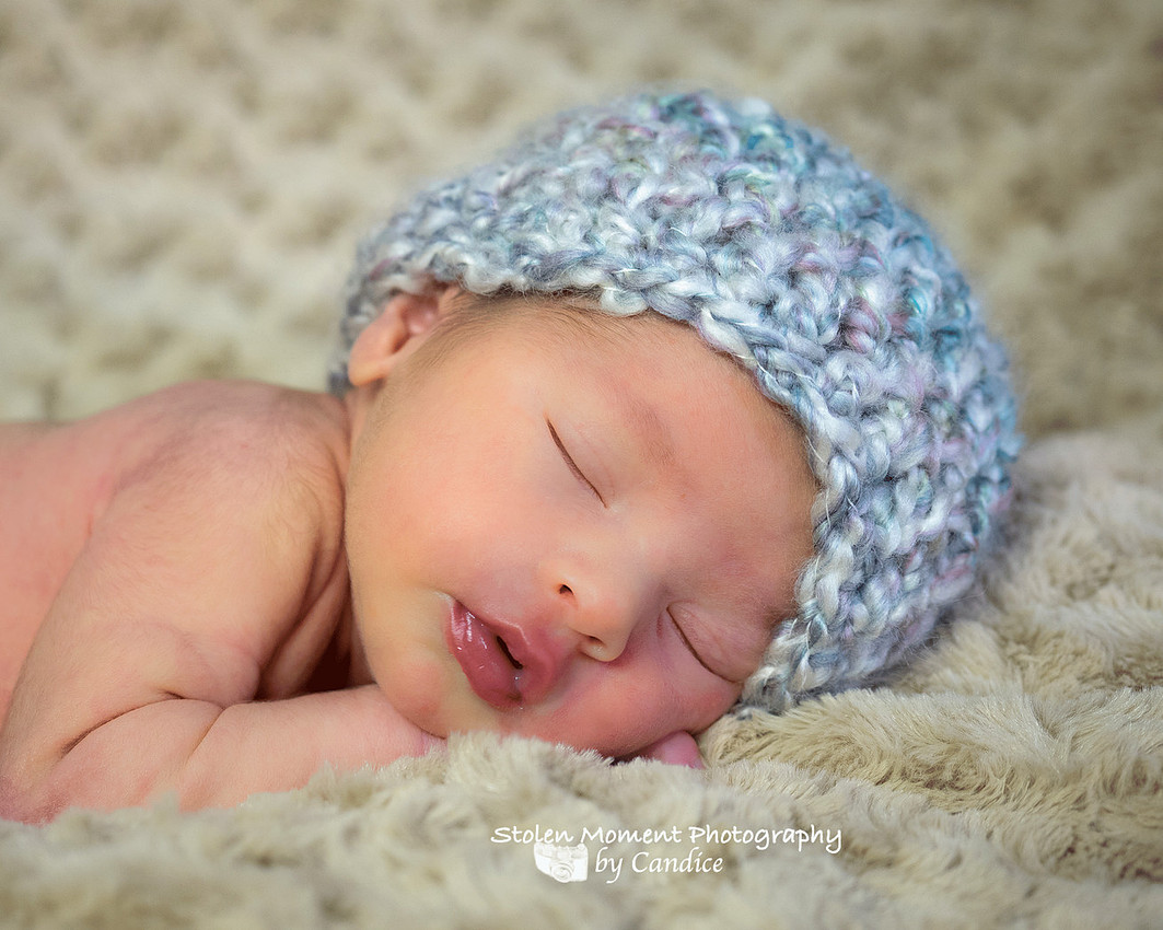 close up of newborn girl's face