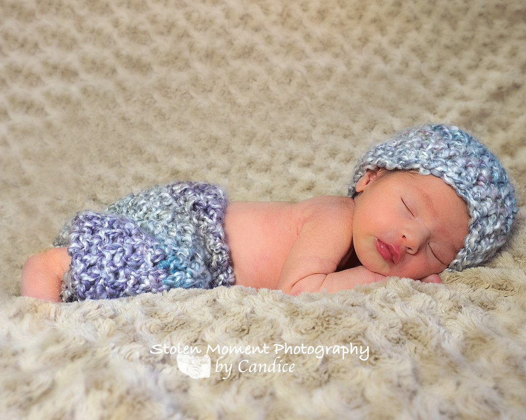 full length newborn girl in cute outfit