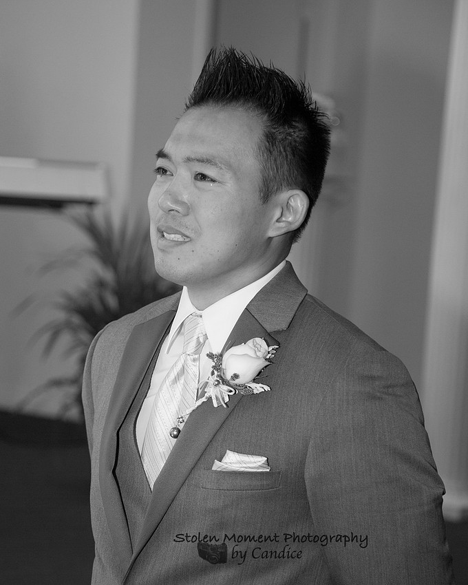 groom seeing bride walking down the aisle