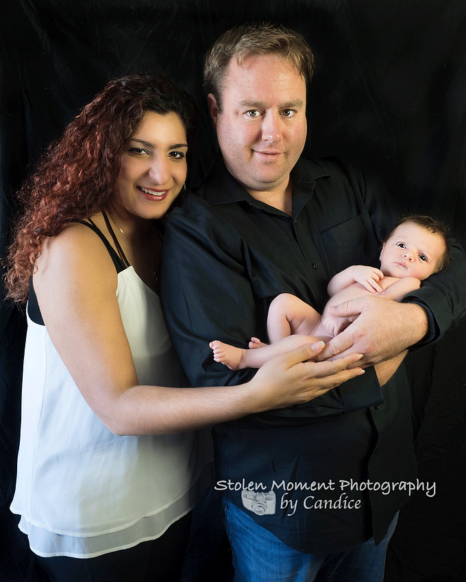 Mom, Dad and their Newborn daughter