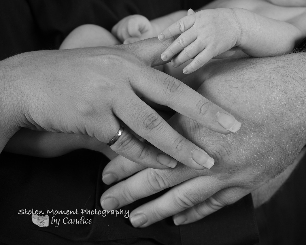 Mom, Dad and baby's hands