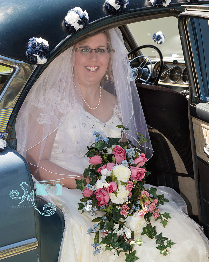 bride sitting in 1952 Packard