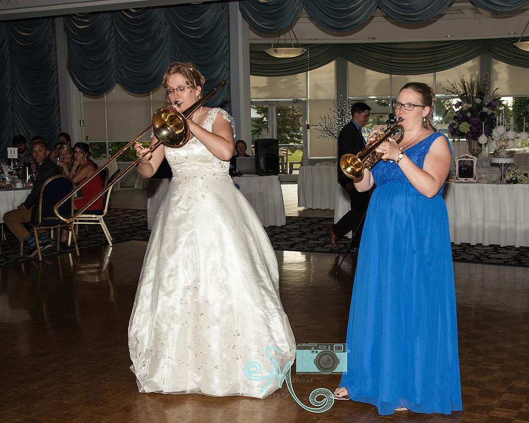Bride and her sister playing instruments