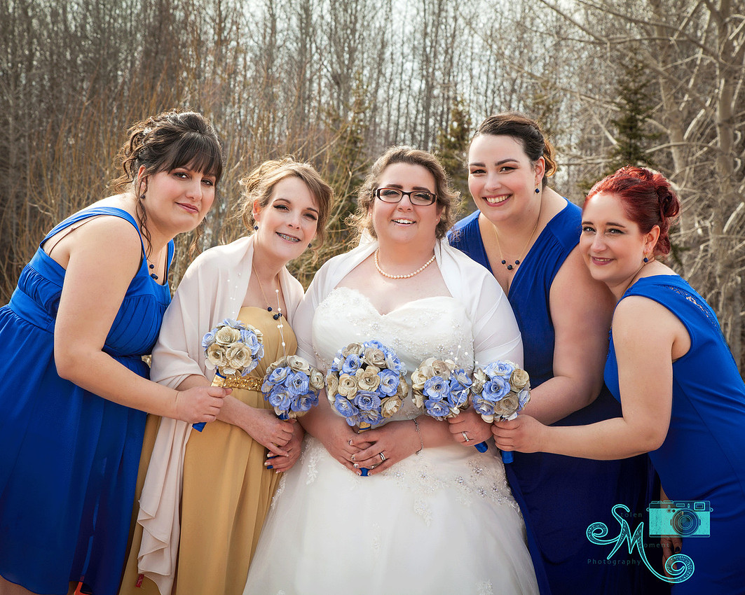 bride with her bridesmaids