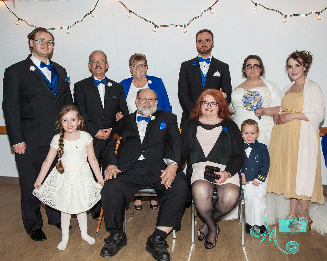 family of bride and groom together