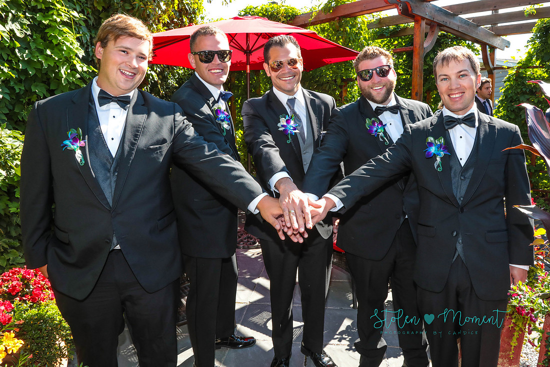 the guys do a hands in shot as one of their getting ready shots