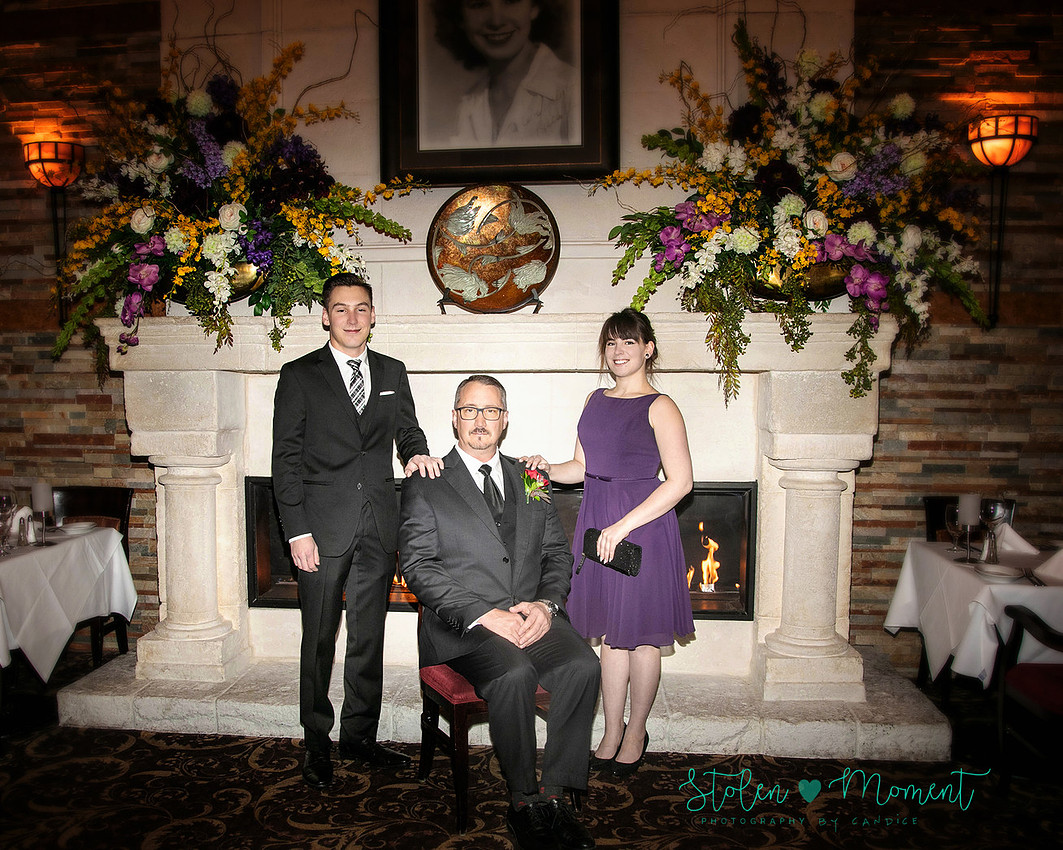 a couple are married in an elegant and intimate wedding ceremony at Ruth's Chris restaurant.