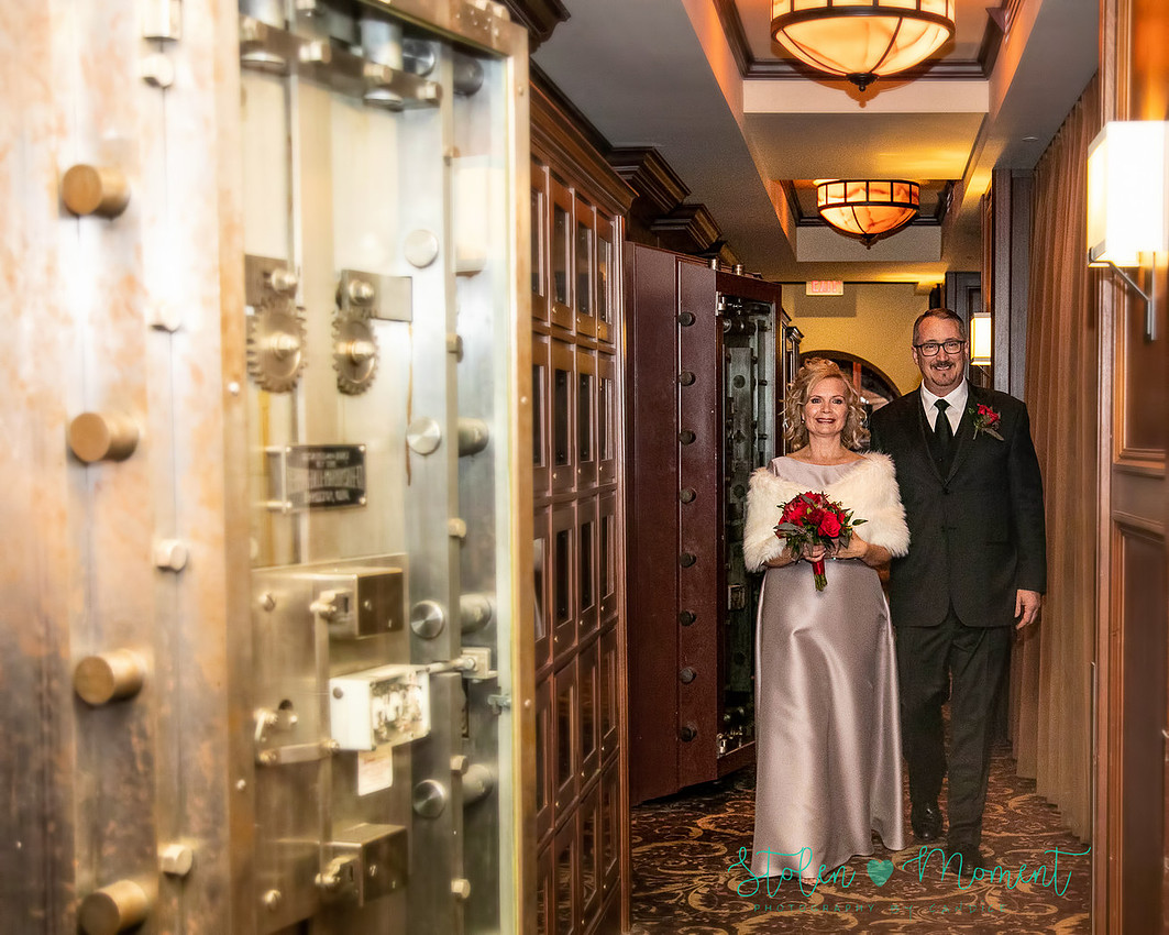 a couple are married in an elegant and intimate wedding ceremony at Ruth's Chris restaurant.