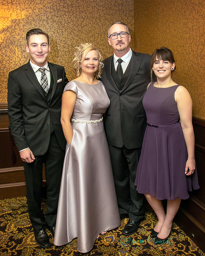 a couple are married in an elegant and intimate wedding ceremony at Ruth's Chris restaurant.