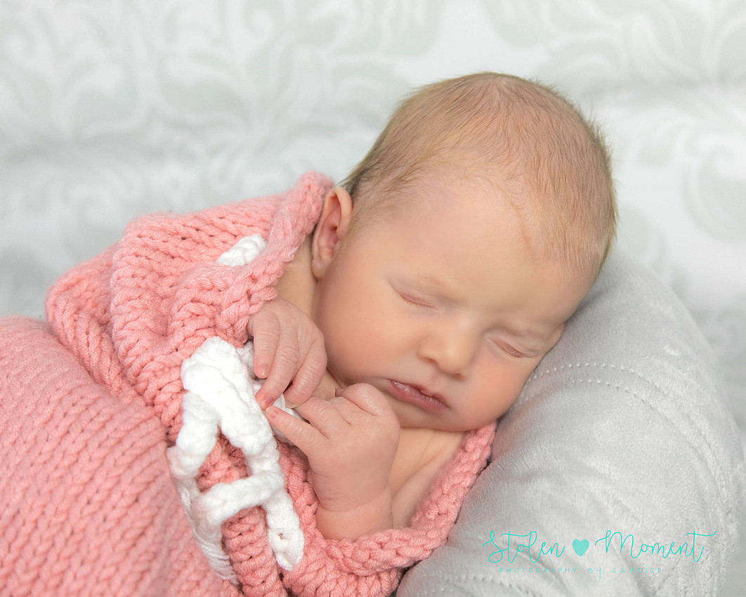 an 11 day old baby girl along with her mom and dad