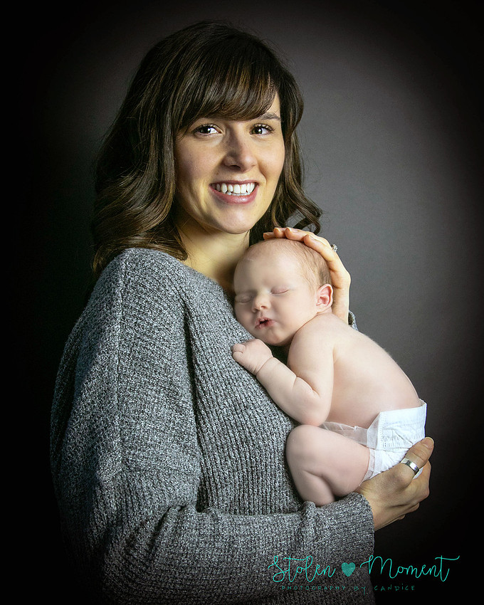 an 11 day old baby girl along with her mom and dad