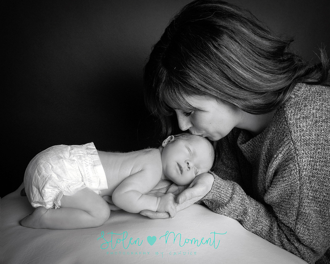 an 11 day old baby girl along with her mom and dad