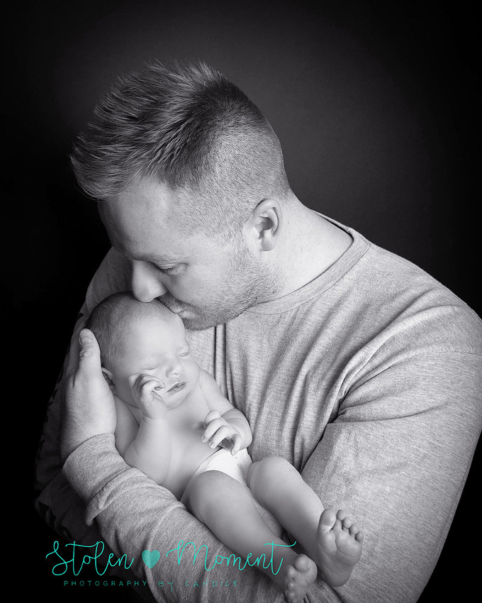 an 11 day old baby girl along with her mom and dad