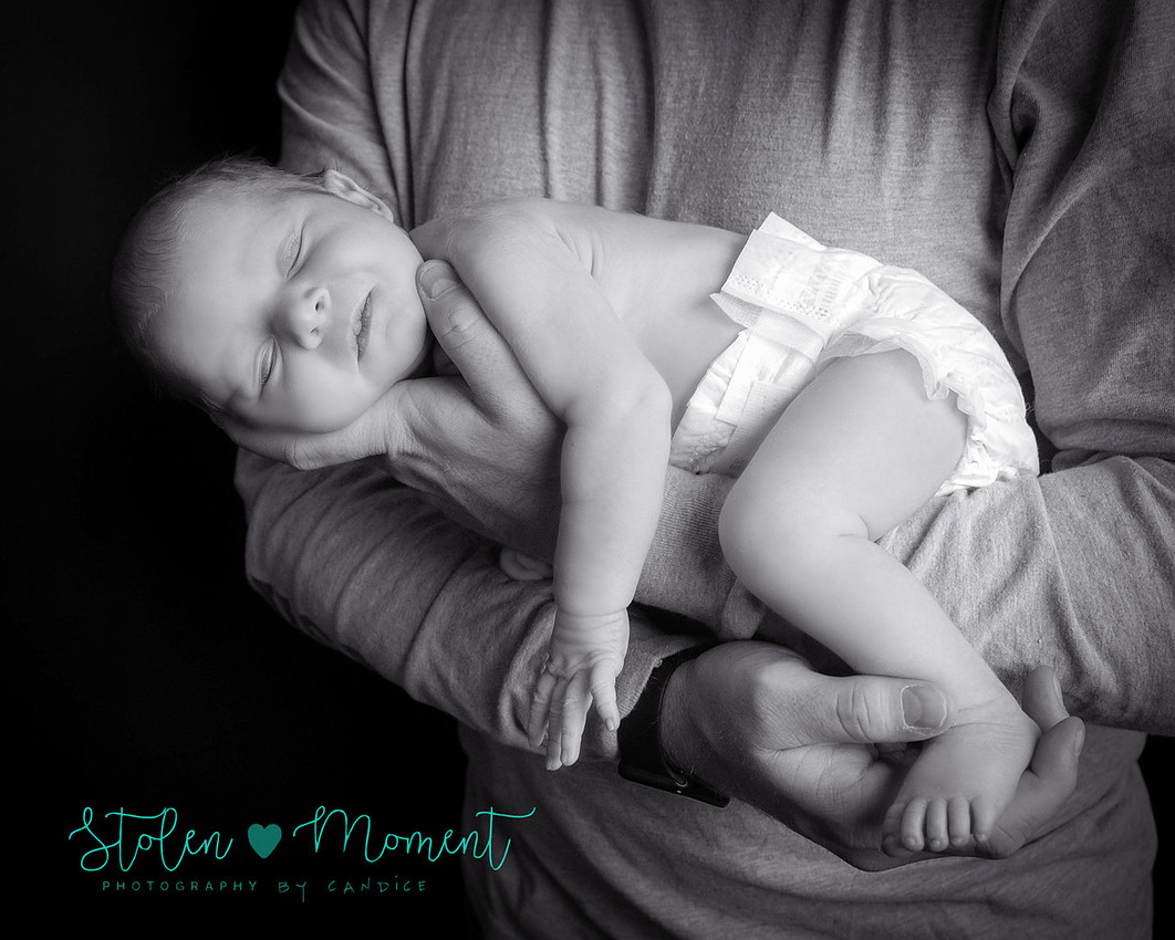 an 11 day old baby girl along with her mom and dad
