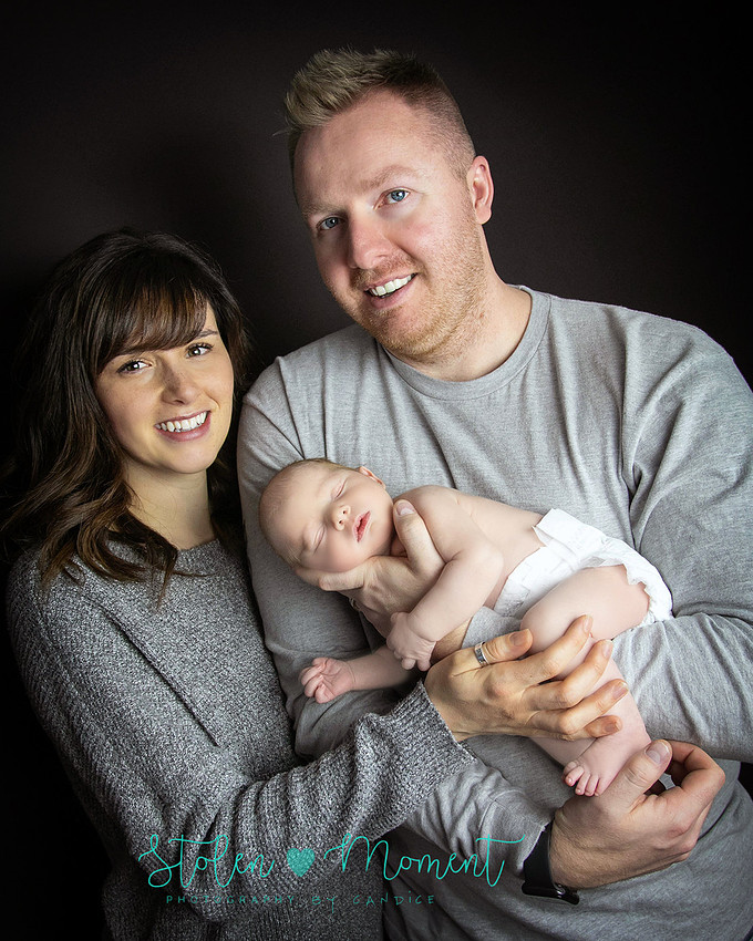 an 11 day old baby girl along with her mom and dad