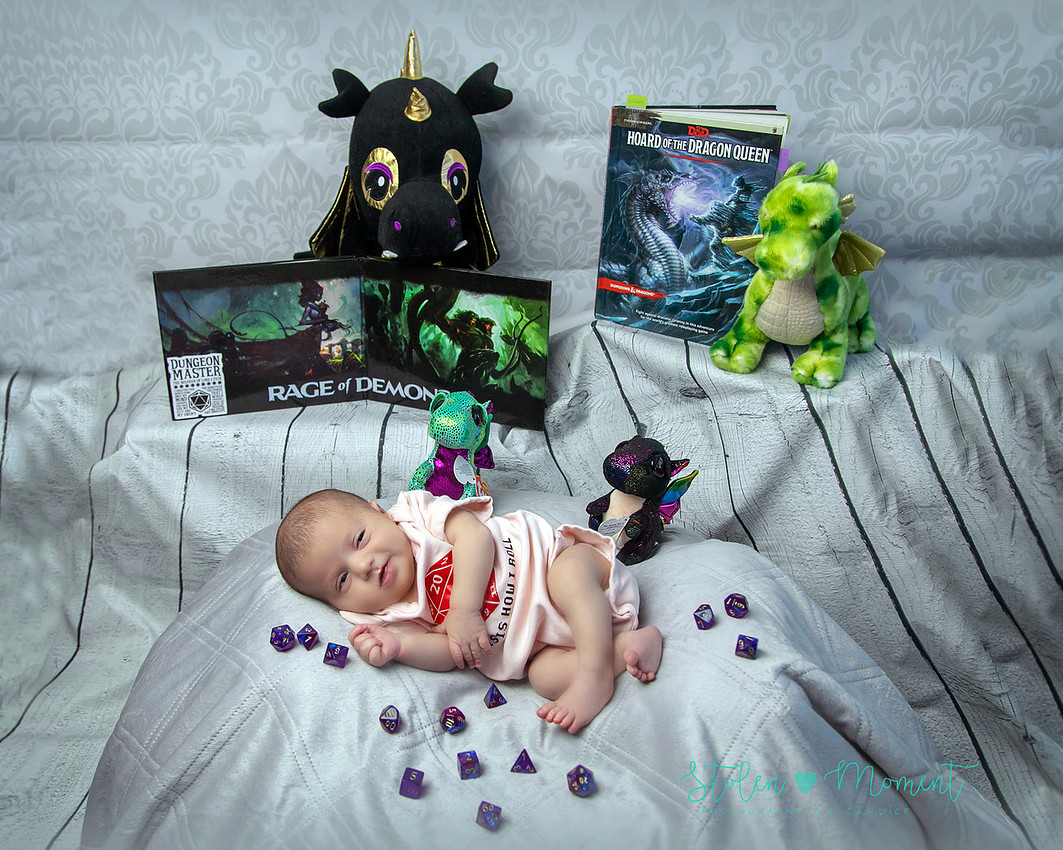 a 13 day old newborn girl alone and with her parents. 