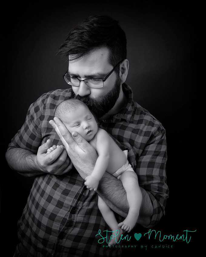 a 13 day old newborn girl alone and with her parents. 