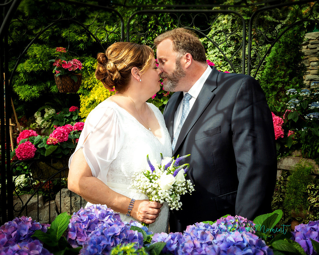 A couple wed in an intimate ceremony at the Muttart Conservatory in Edmonton