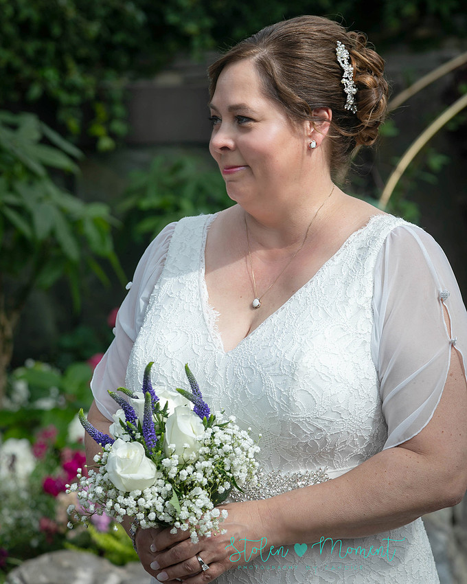 A couple wed in an intimate ceremony at the Muttart Conservatory in Edmonton