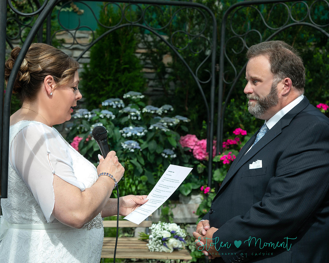 A couple wed in an intimate ceremony at the Muttart Conservatory in Edmonton