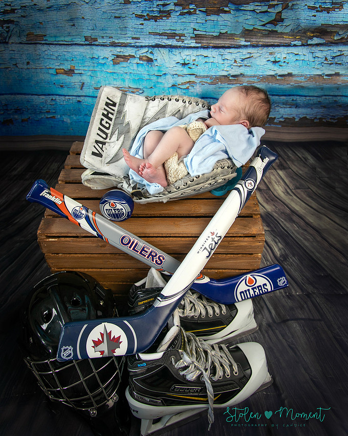 Welcoming a six day old boy in photos alone and with his two older sisters and mom and dad