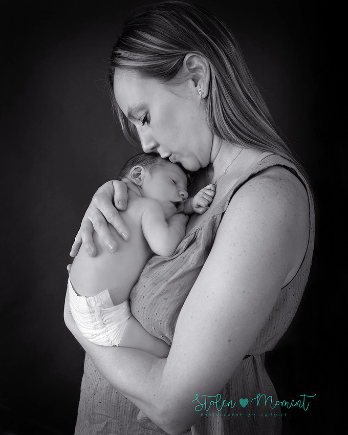 Welcoming a six day old boy in photos alone and with his two older sisters and mom and dad