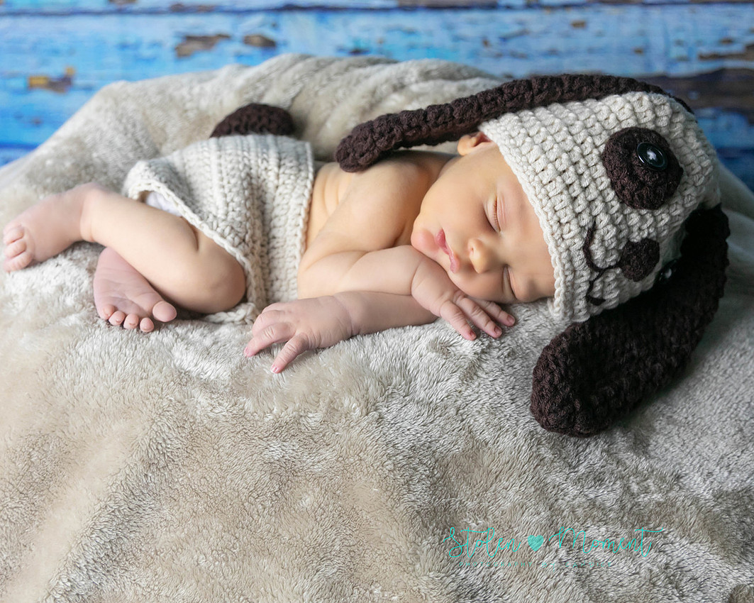 a 7 day old baby boy with his 3 year old big brother, his mom and his dad