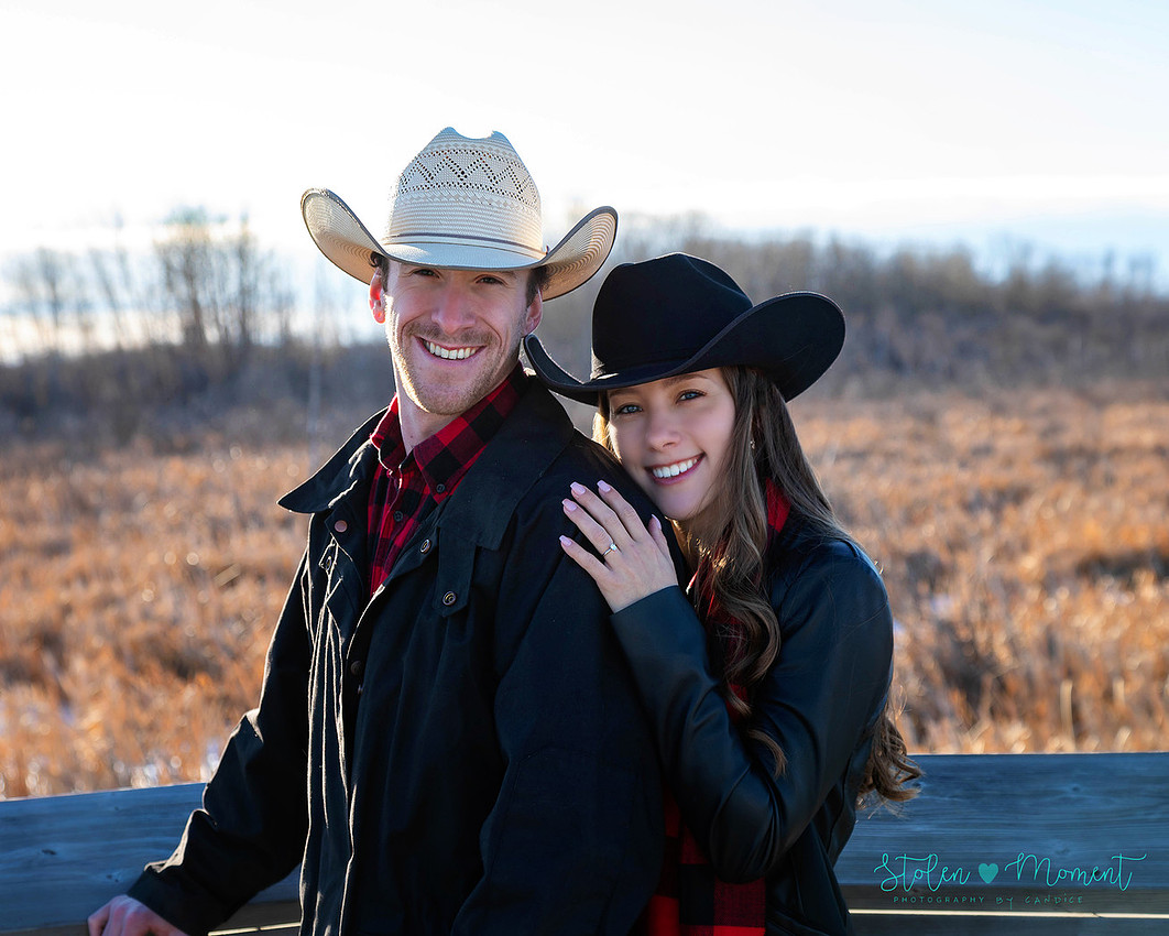 a beautiful engaged couple have their engagement photos done at Lois Hole Centennial Provincial Park