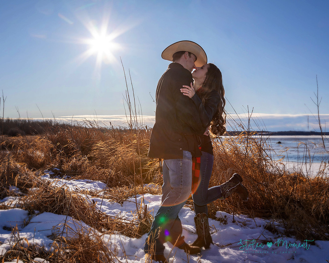 a beautiful engaged couple have their engagement photos done at Lois Hole Centennial Provincial Park
