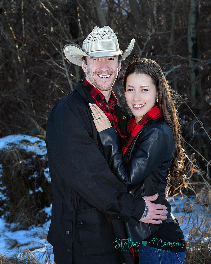 a beautiful engaged couple have their engagement photos done at Lois Hole Centennial Provincial Park