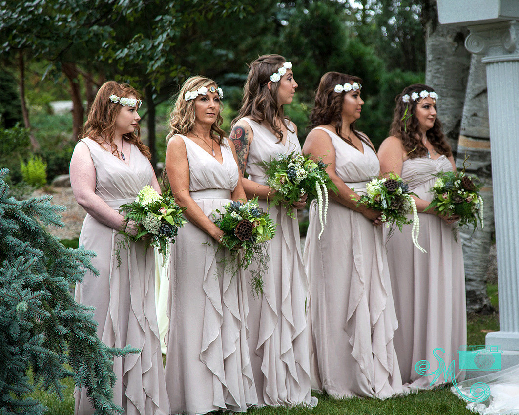 bridesmaids standing at altar